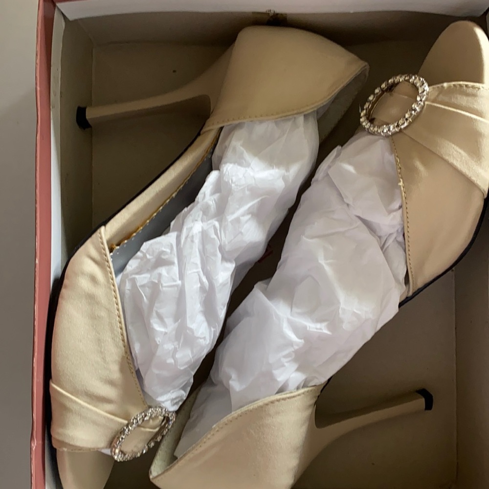 Light cream heeled formal dress shoes